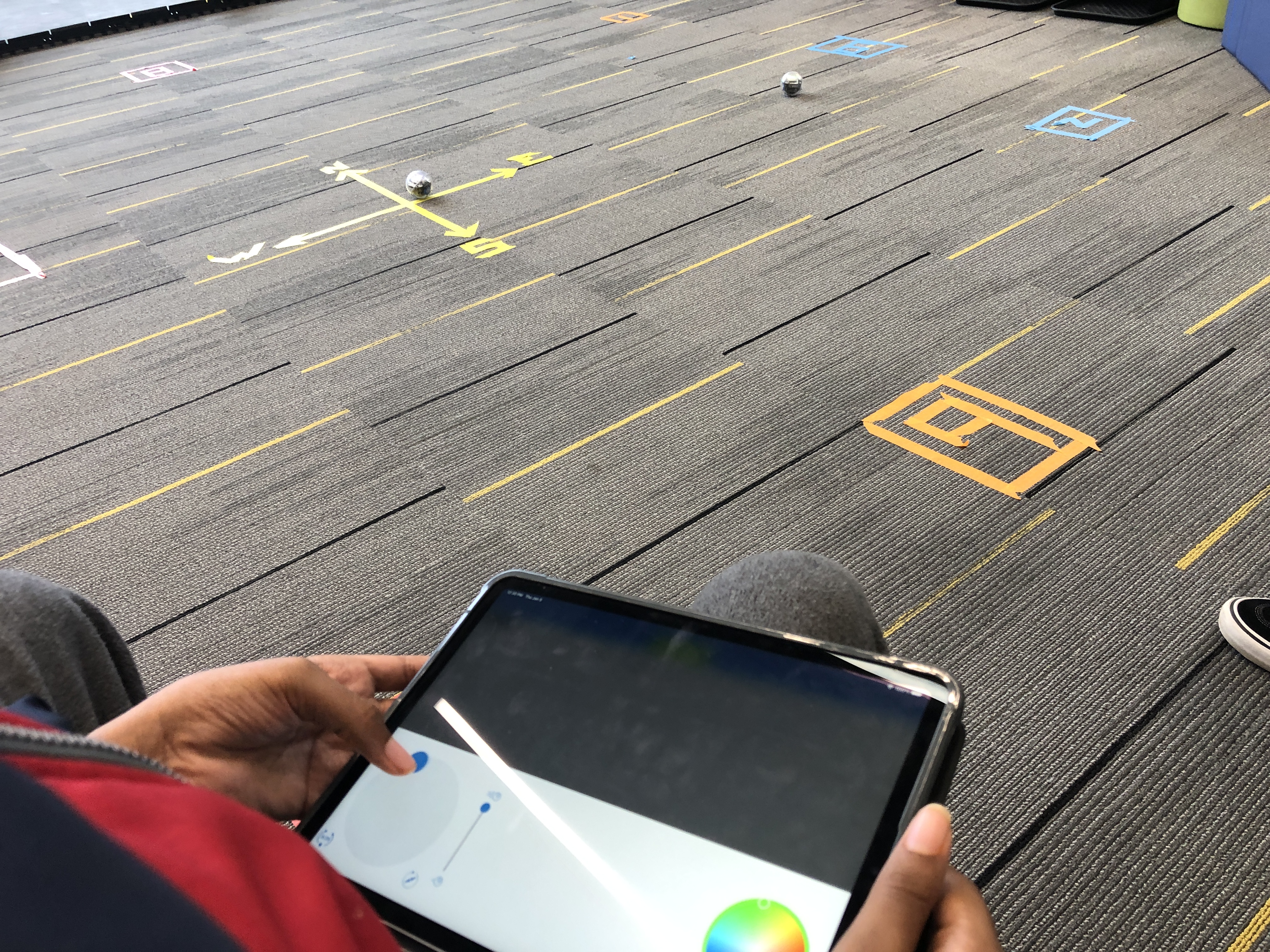 Sphero lesson about cardinal directions including driving screen on ipads