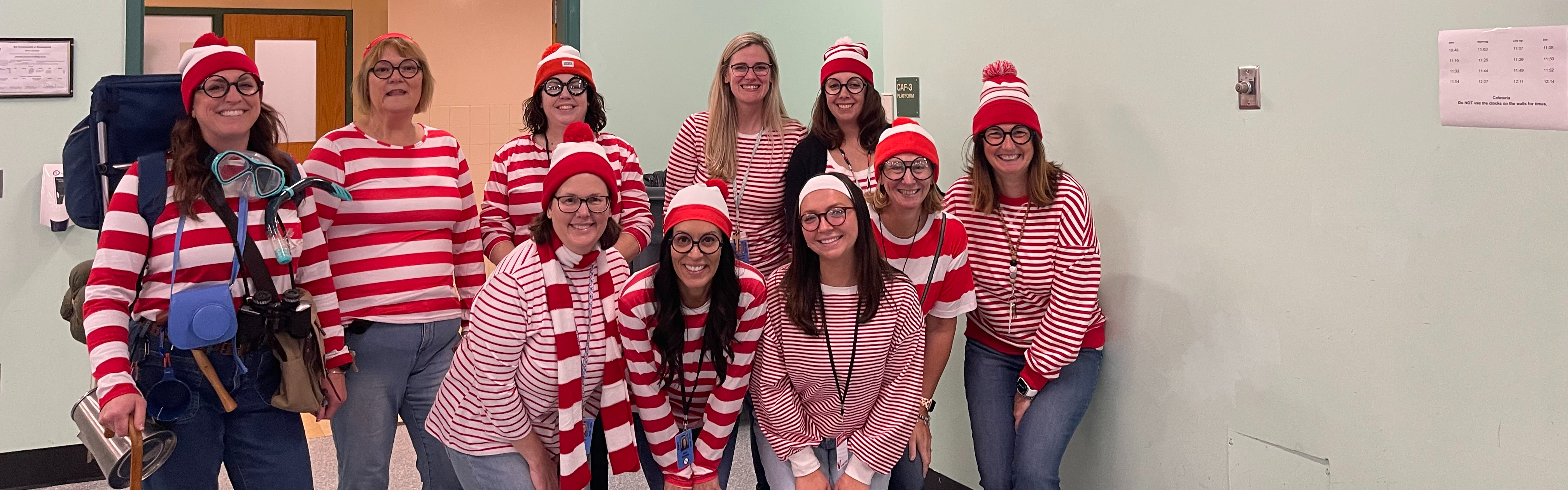 Teachers dressed as Waldo for halloween.