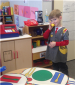 kid playing in play center