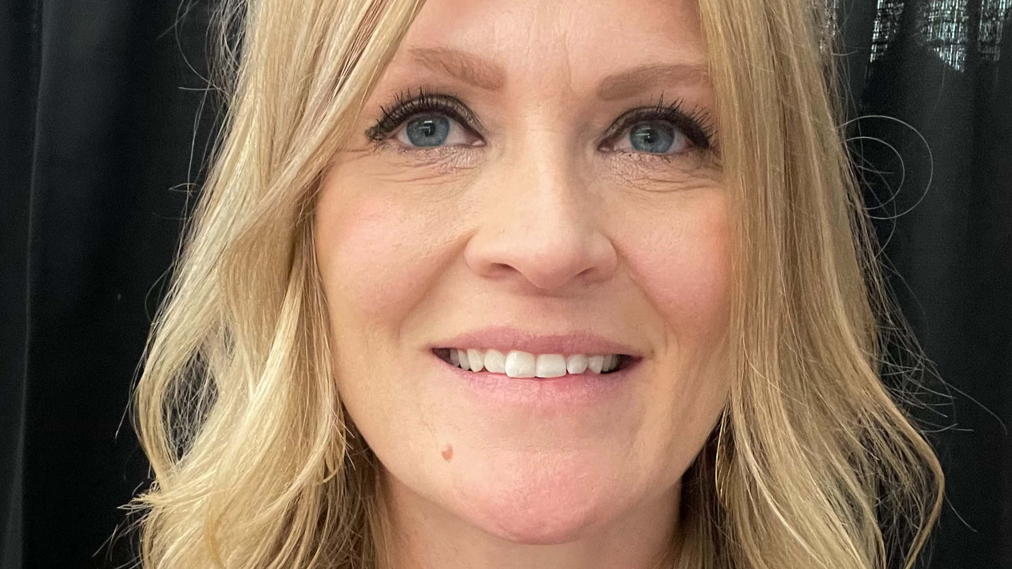 blonde woman smiling
