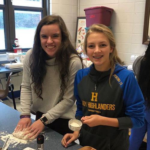 Two girl students smiling