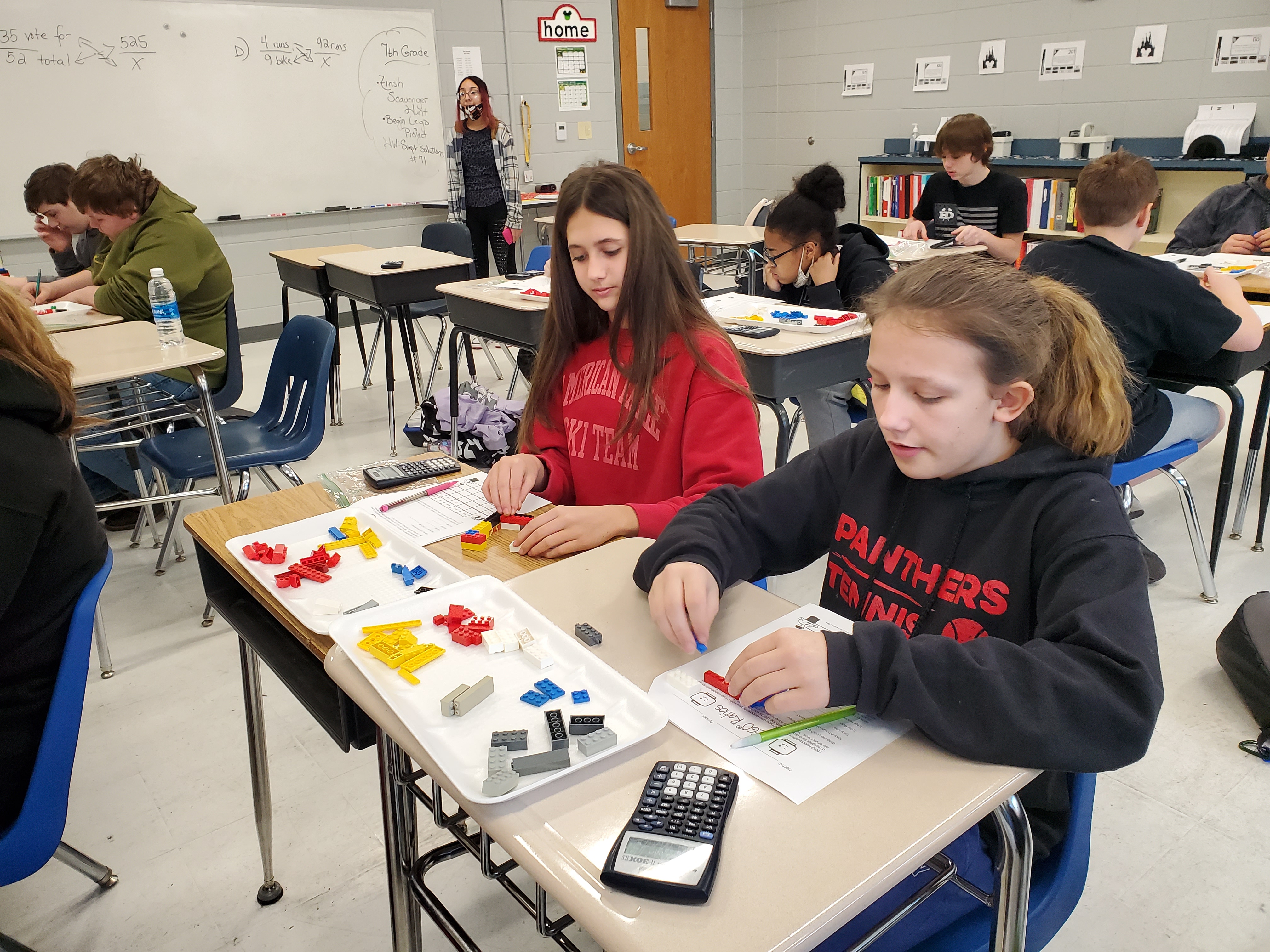 image of students using legos as math manipulatives