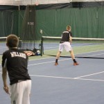 photos of tennis players playing match at court