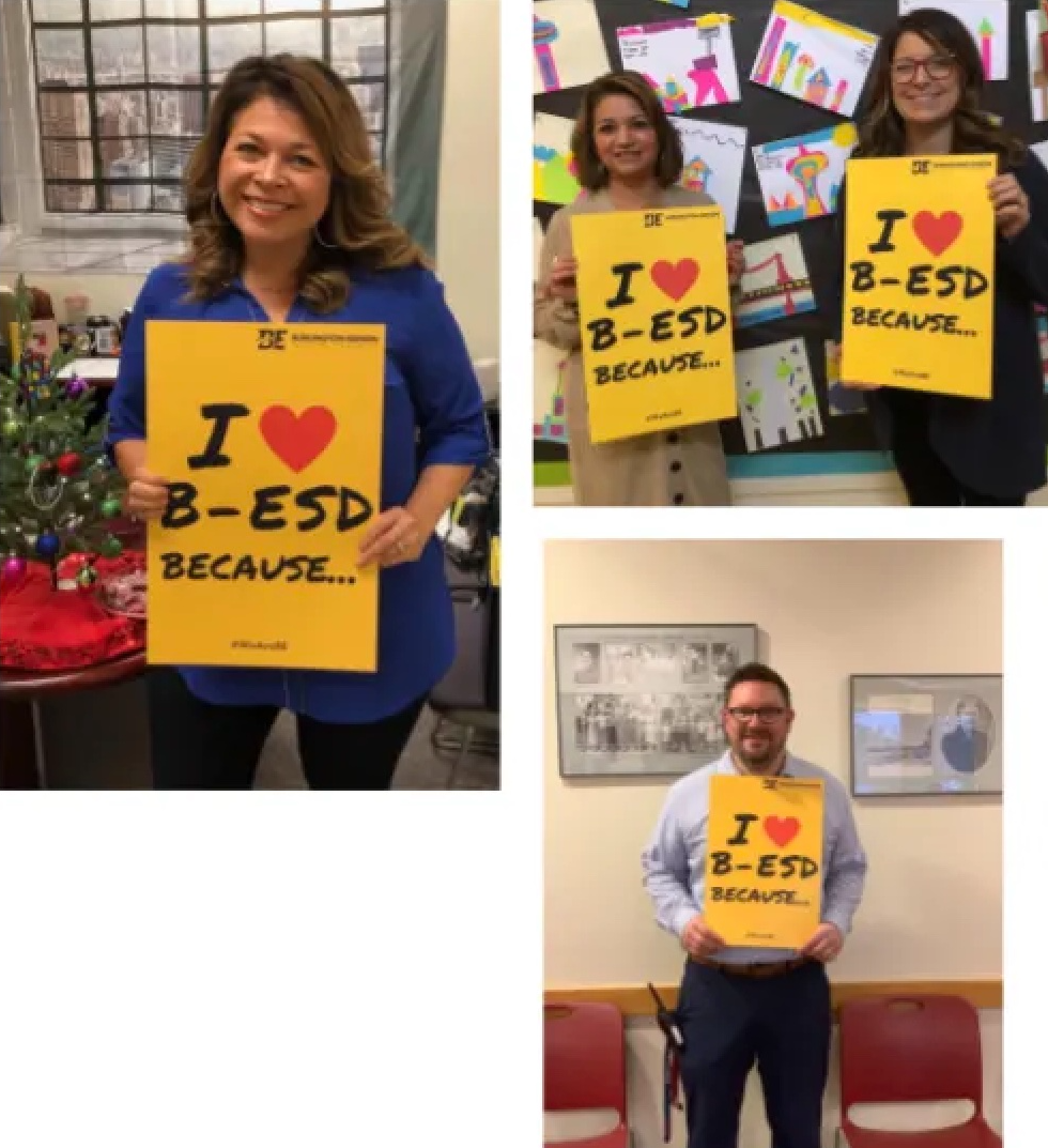 Image of four teachers holding up yellow signs that say "I love B-ESD because..."