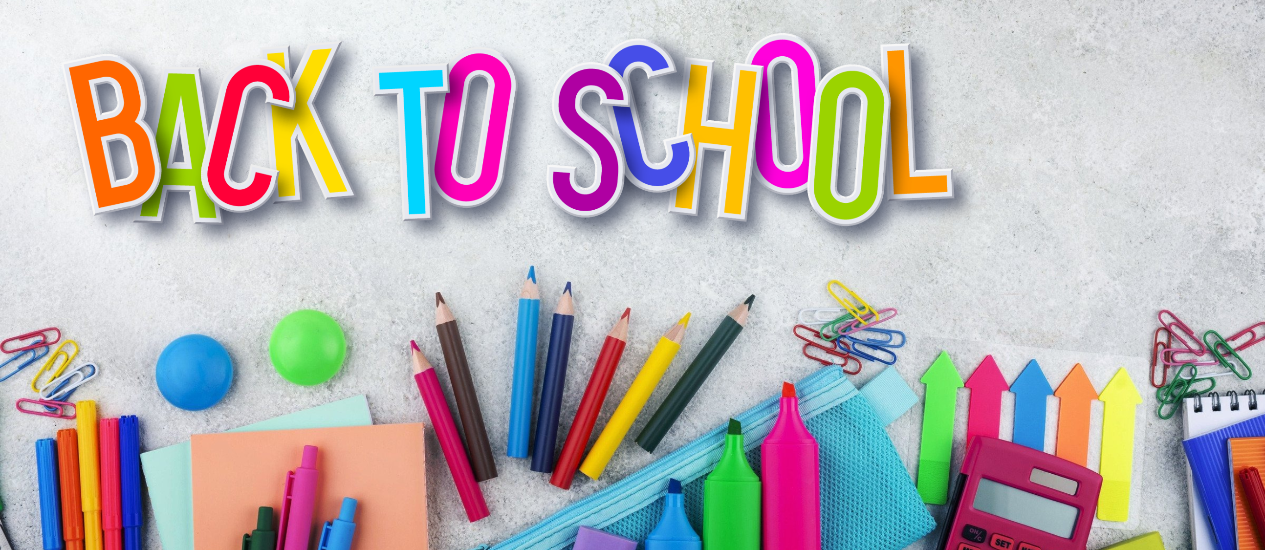 Colorful letters spelling "Back to School"  over an array of school supplies
