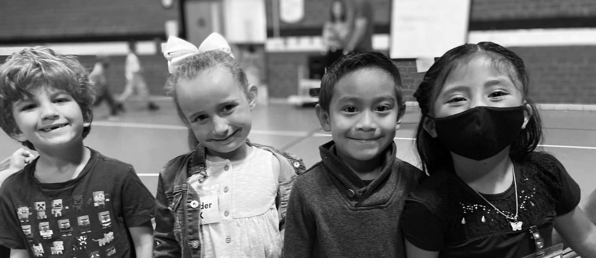 smiling students in gym