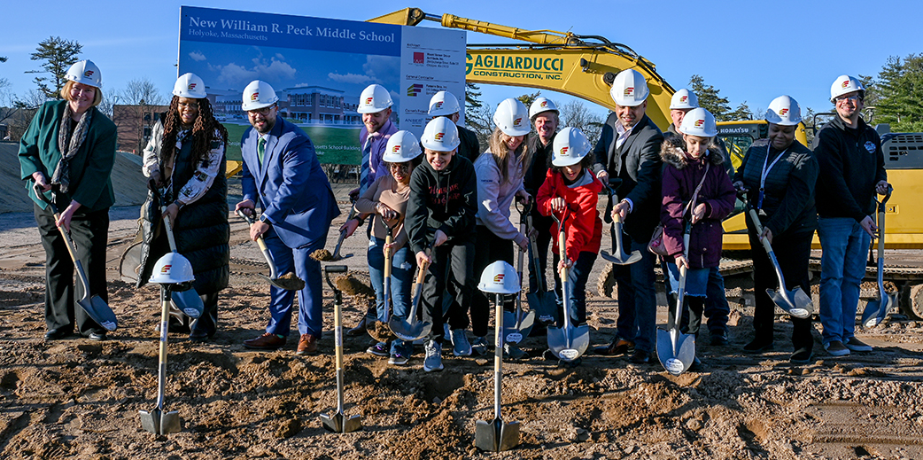 City officials, students, and staff ceremoniously break ground
