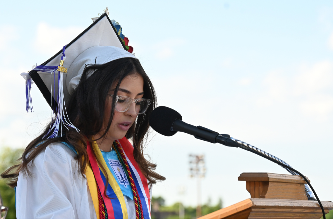 Perserverance speaker Tatiana Restrepo speaks during her graduation ceremony at HHS North.