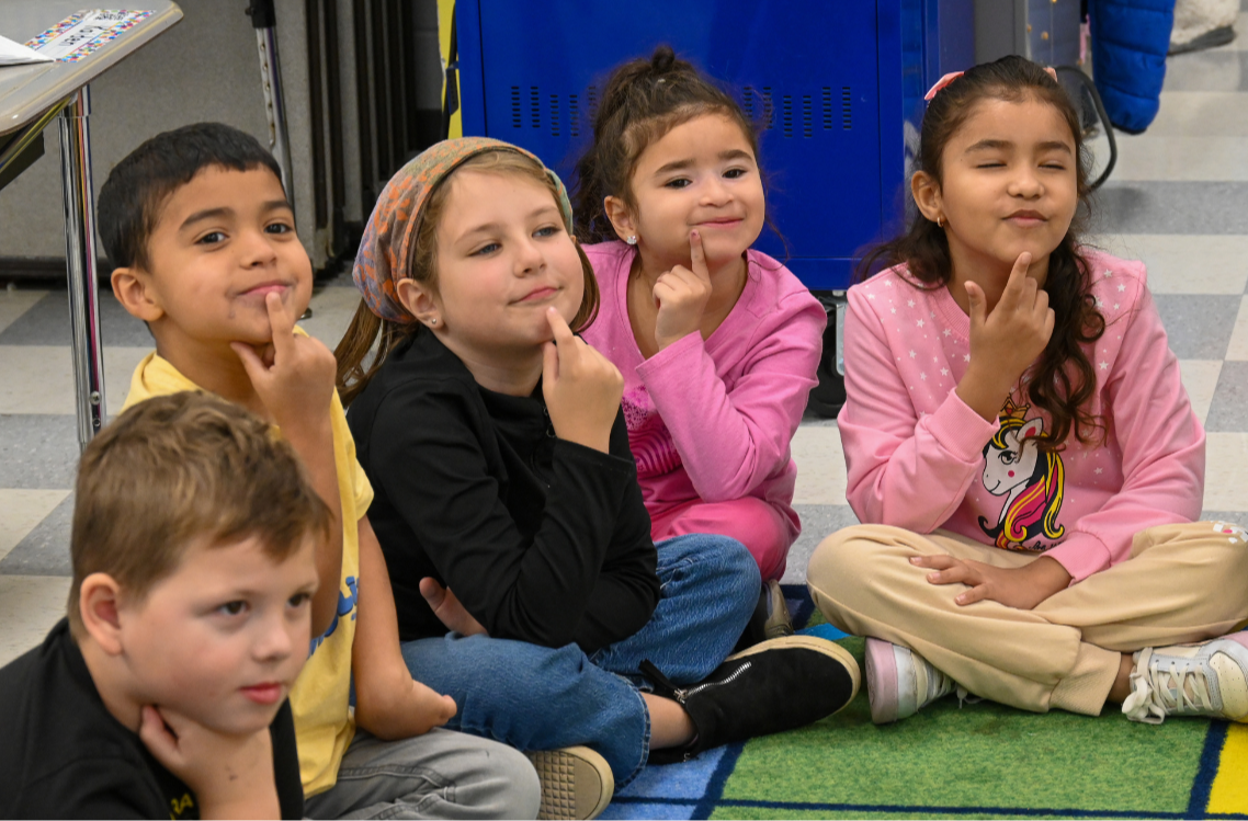 A group of E.N. White students demonstrates active listening