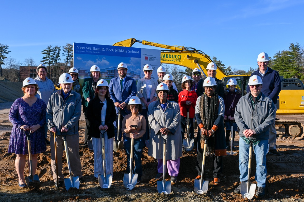 Group of people with shovels