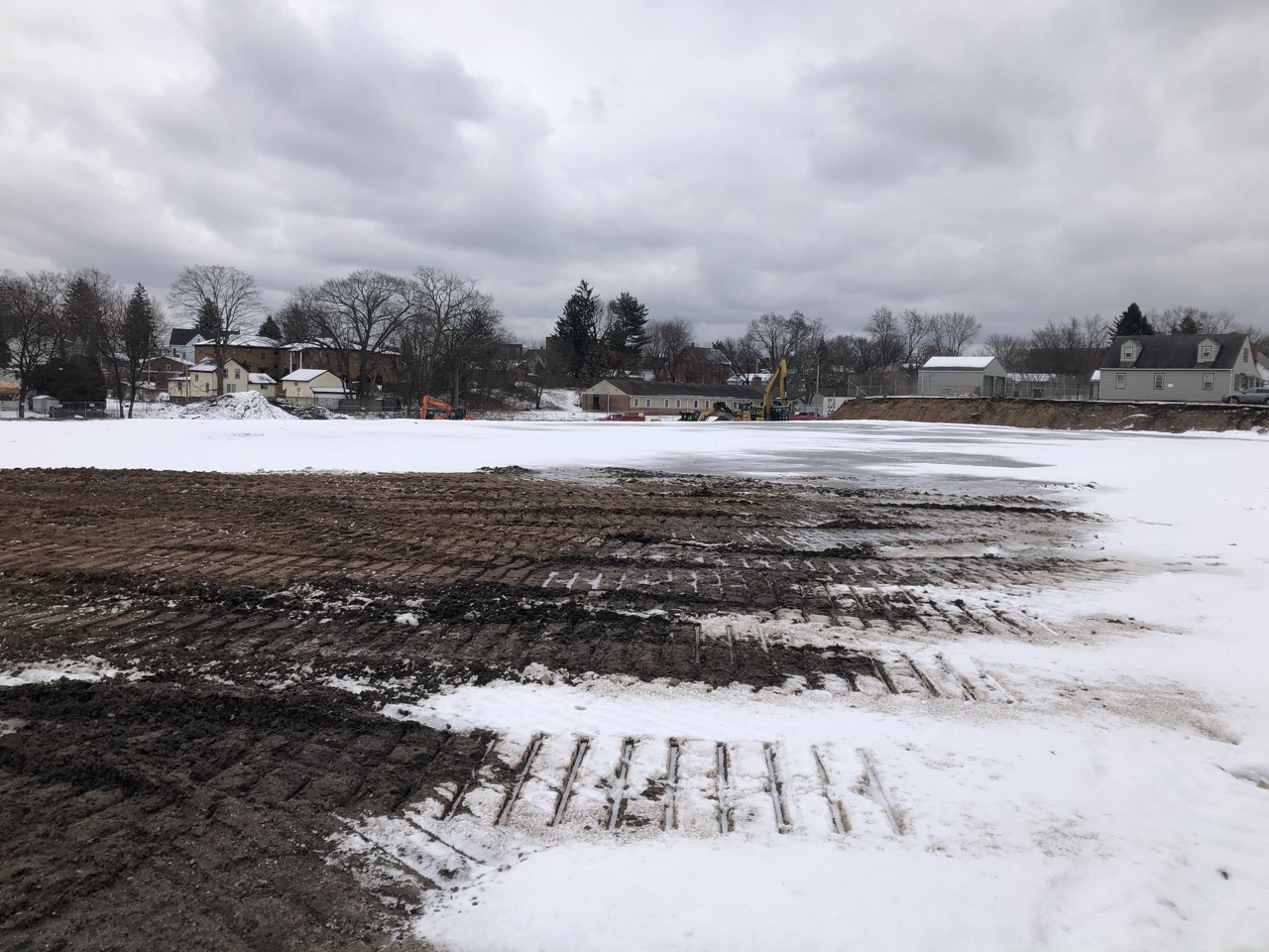 Flattened site with snow