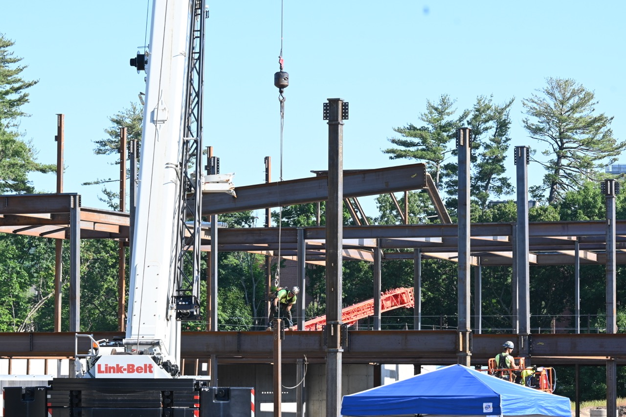 A beam is lifted into place at the new middle school