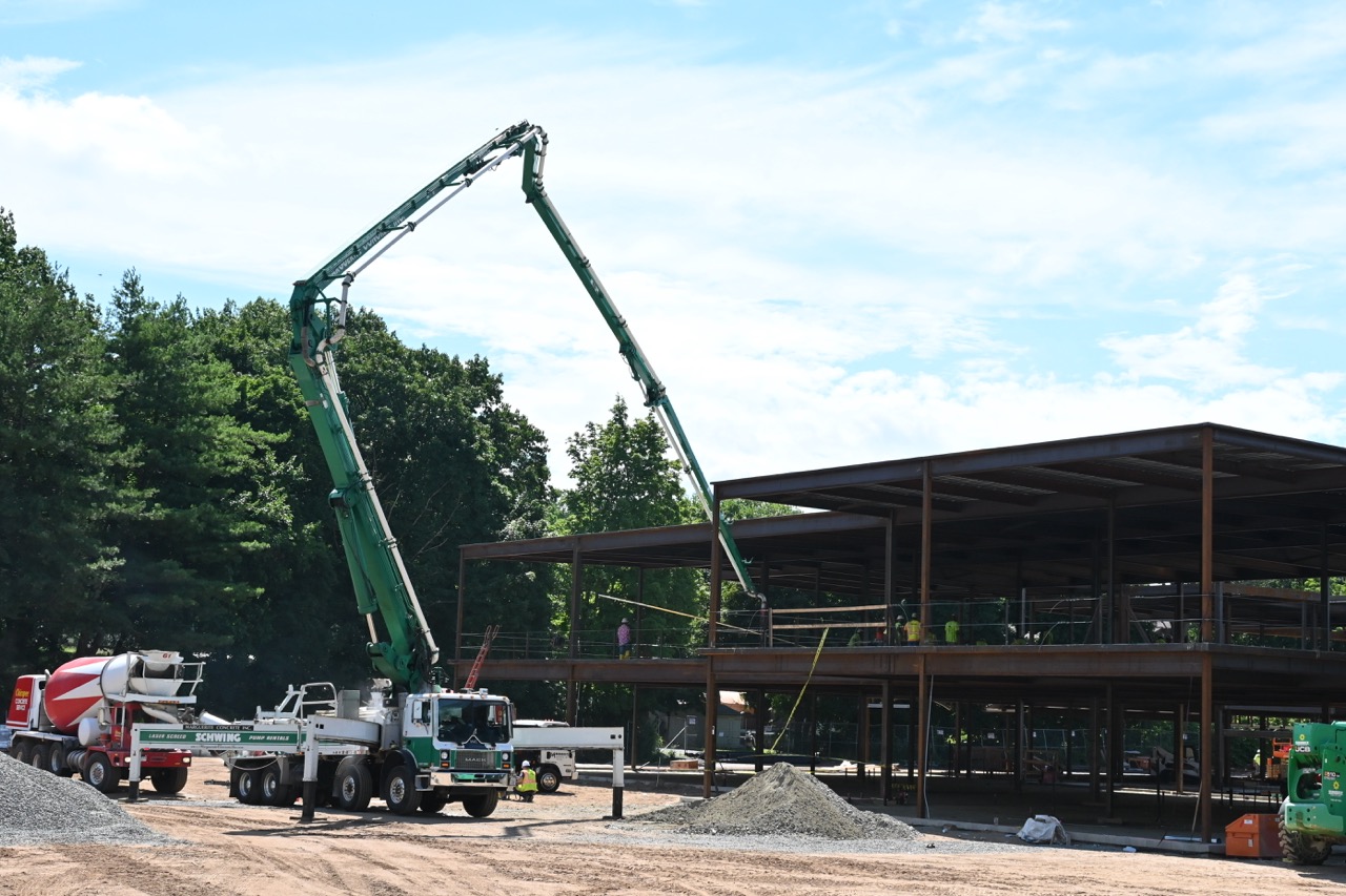 Concrete is lifted and poured onto the second floor