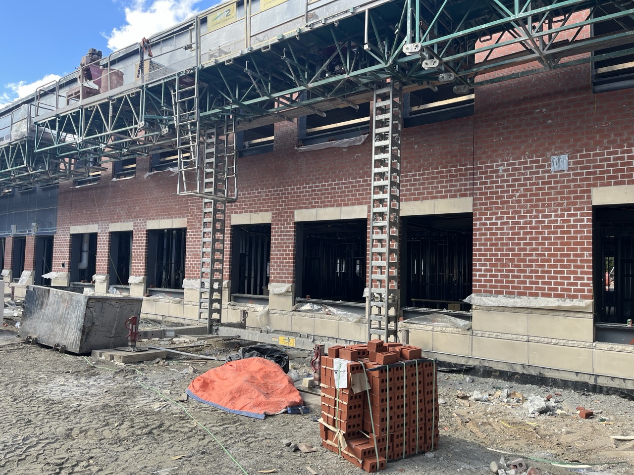 Exterior wall with nearly completed brick work