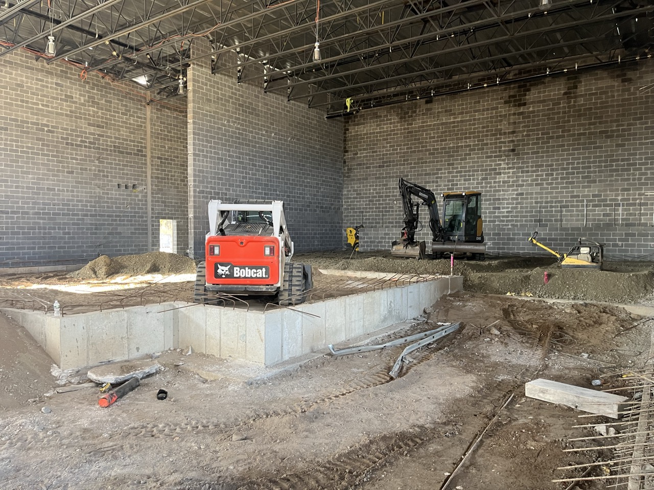 Interior of building with orange machinery