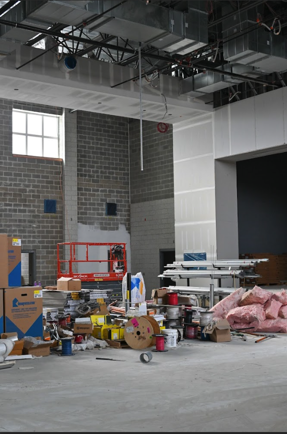 Construction site with scissor lift