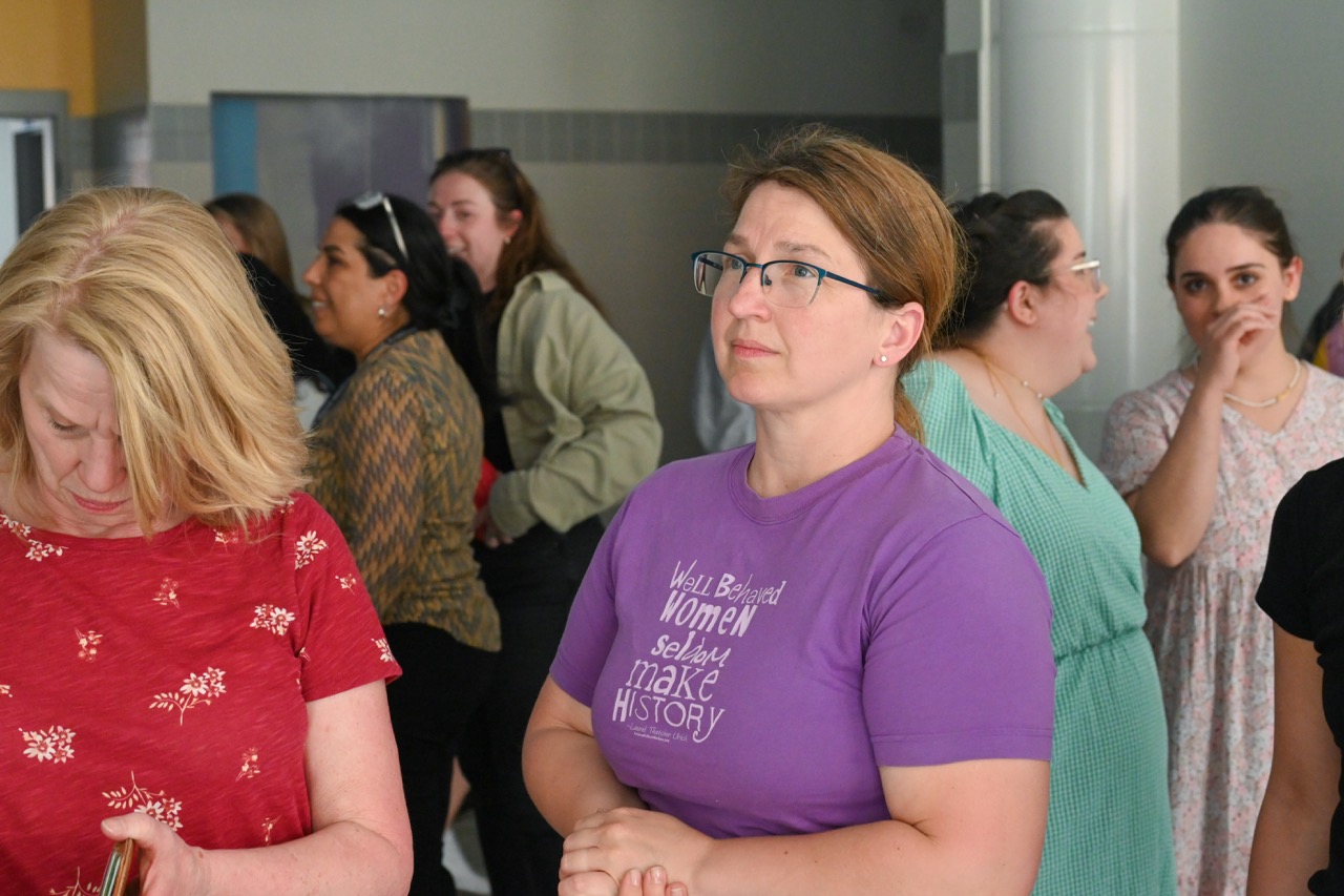 A staff member looks at a feature