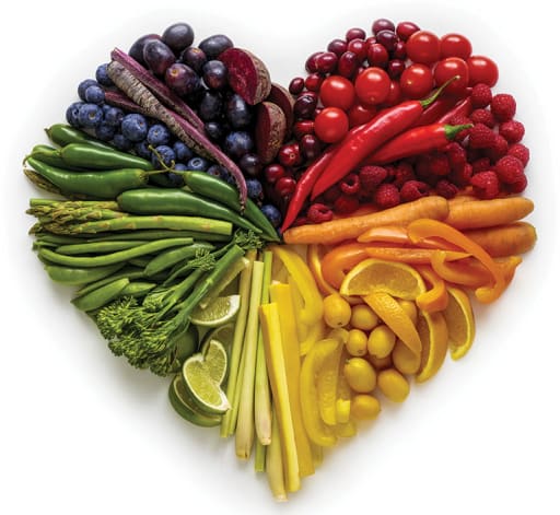 heart made of different colored fruits and veggies