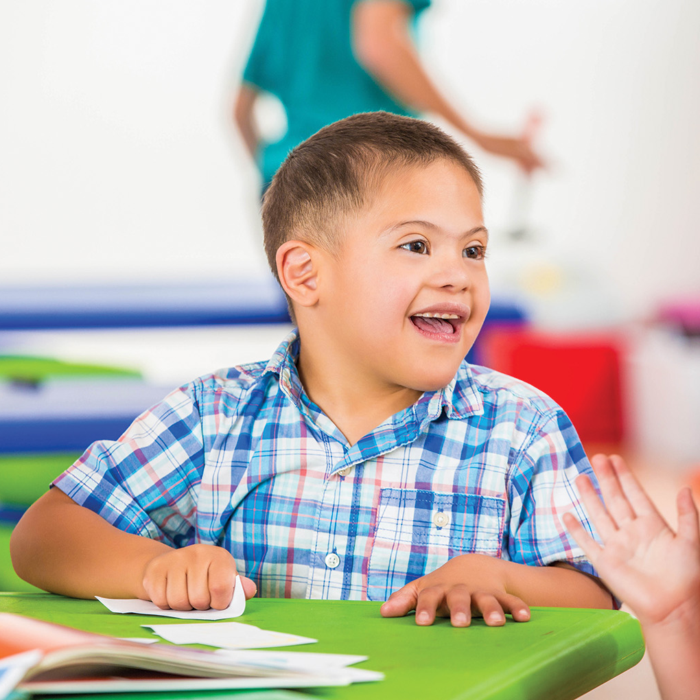 Photo: Child with down syndrome in a classroom