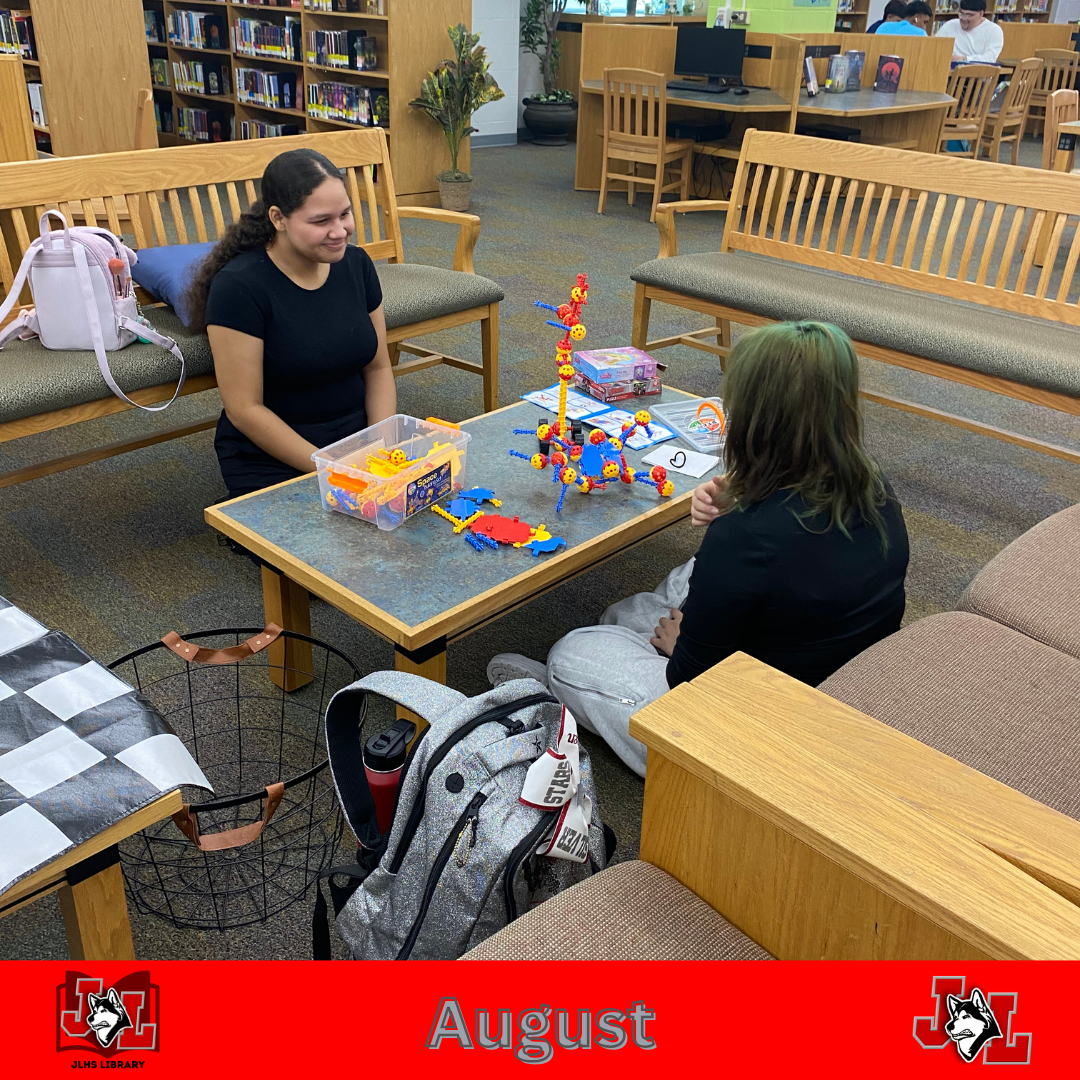 students playing in library