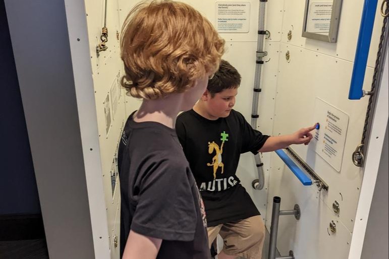students play with equipment