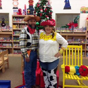 Two staff members dressed as Woody and Jessie from Toy Story
