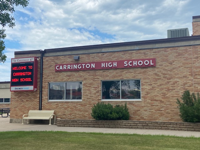 Carrington Public School with marquee stating Welcome to Carrington High School