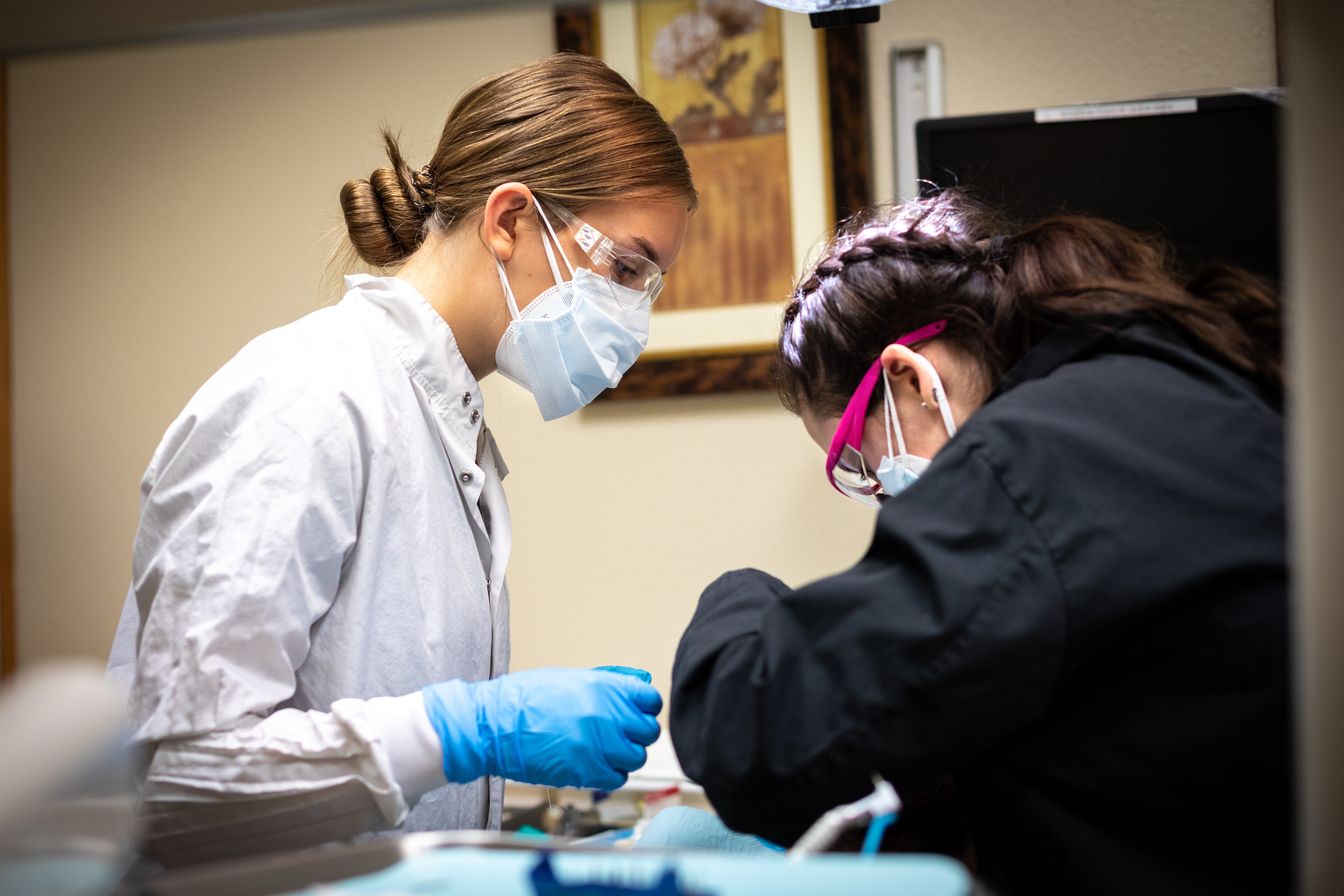 Students working on patient