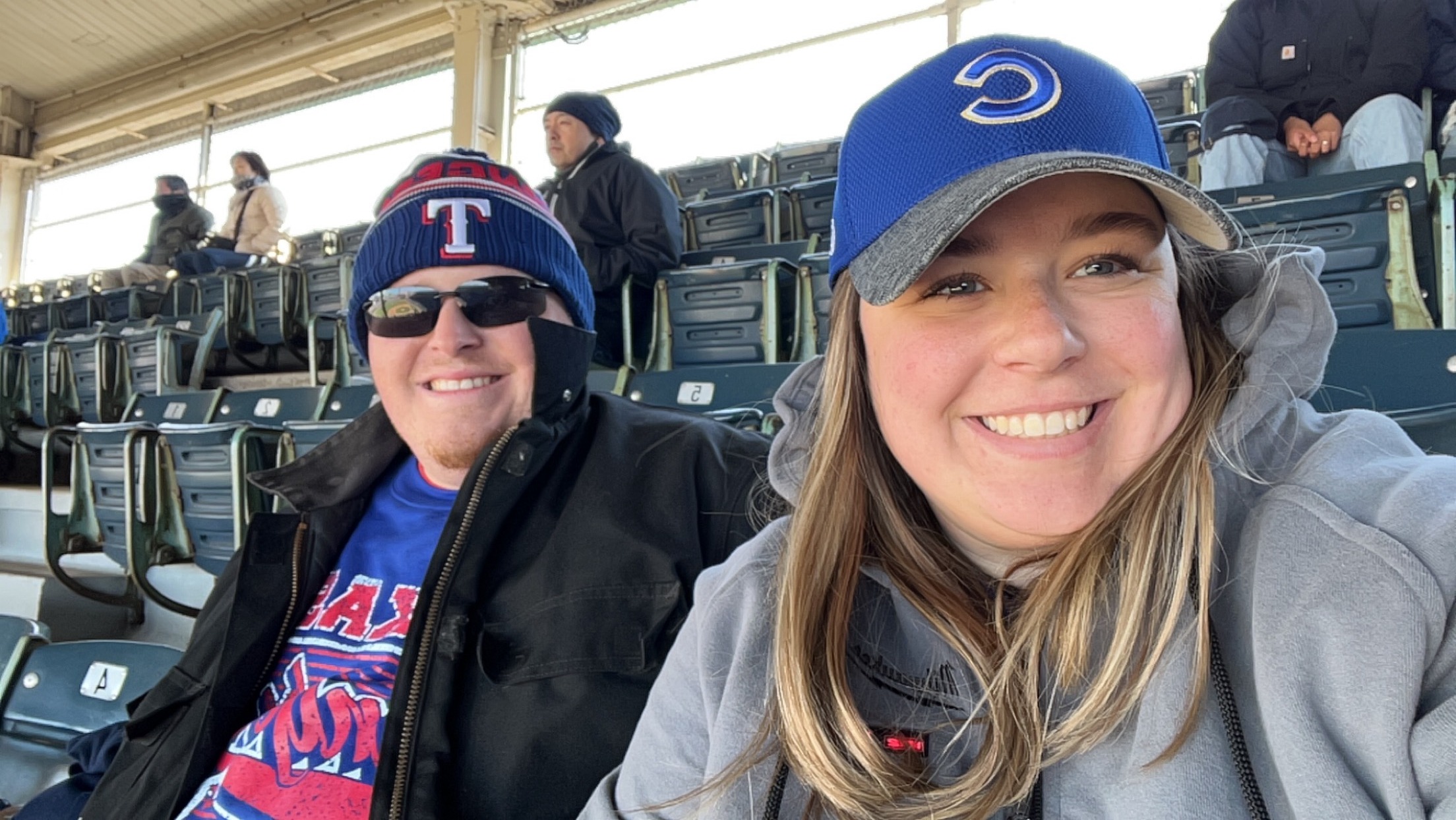 Mrs. Ray and husband at the Cubs vs. Rangers game in Illinois