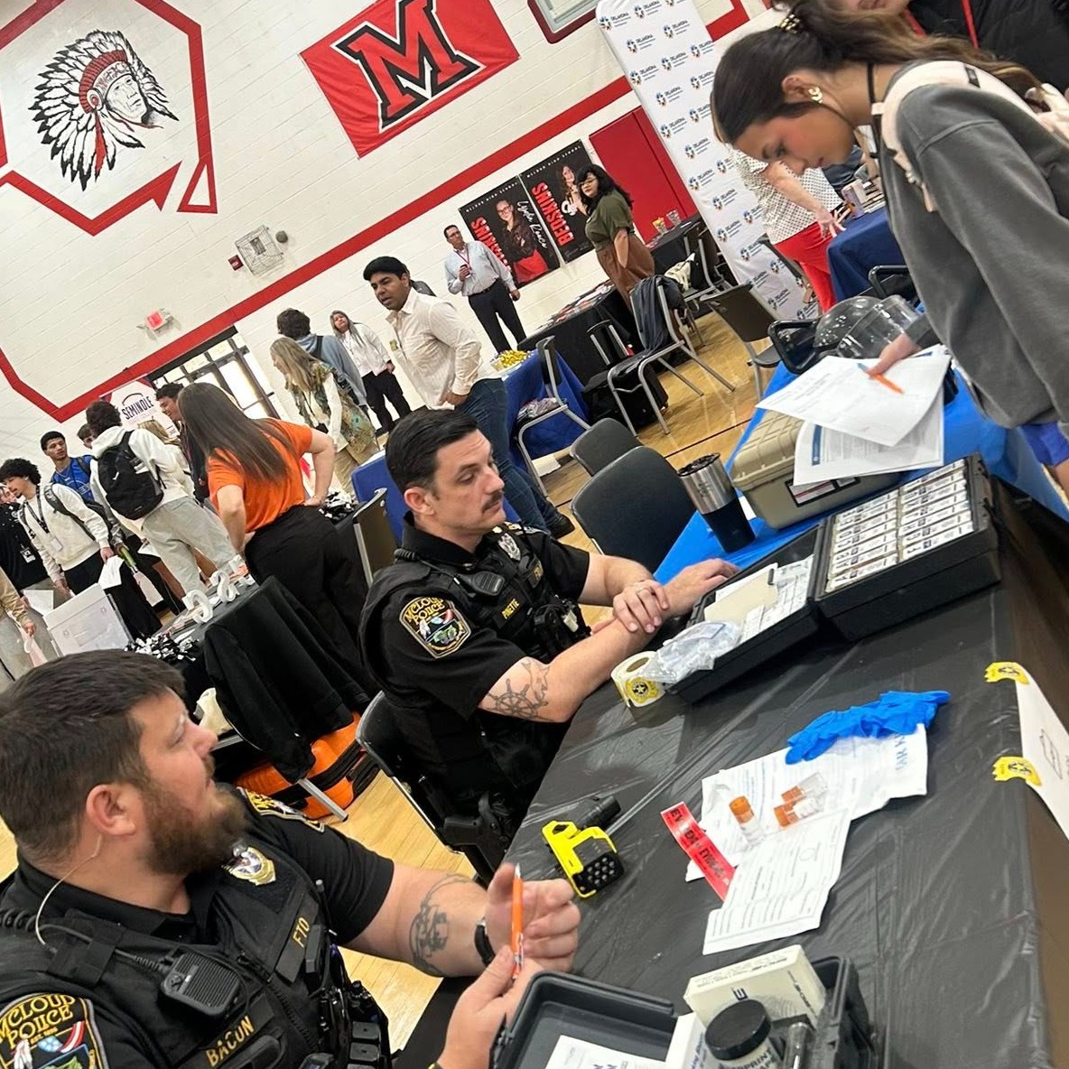 police officers at career fair