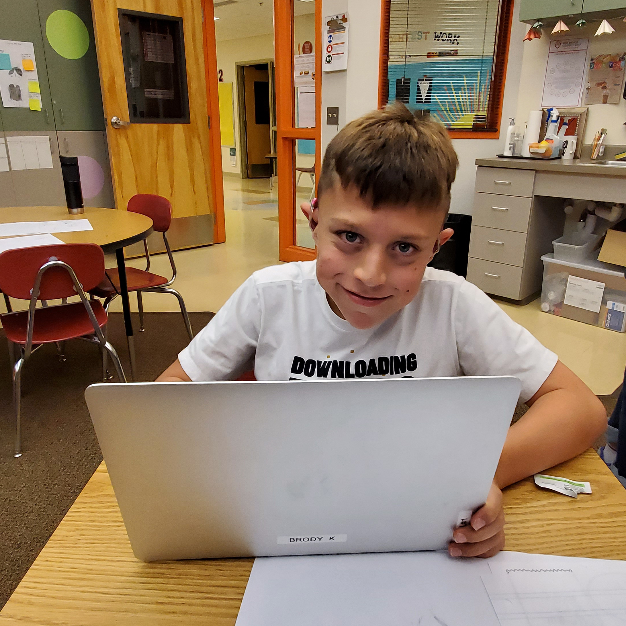 Elementary student with laptop