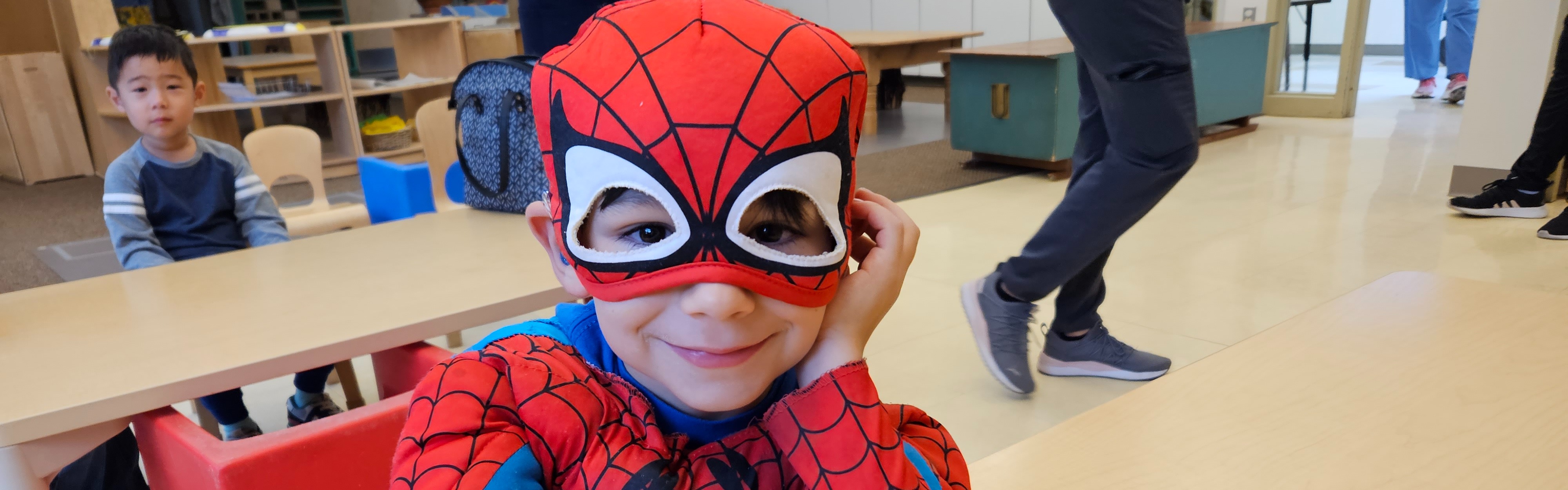 Kindergarten student dressed as spiderman