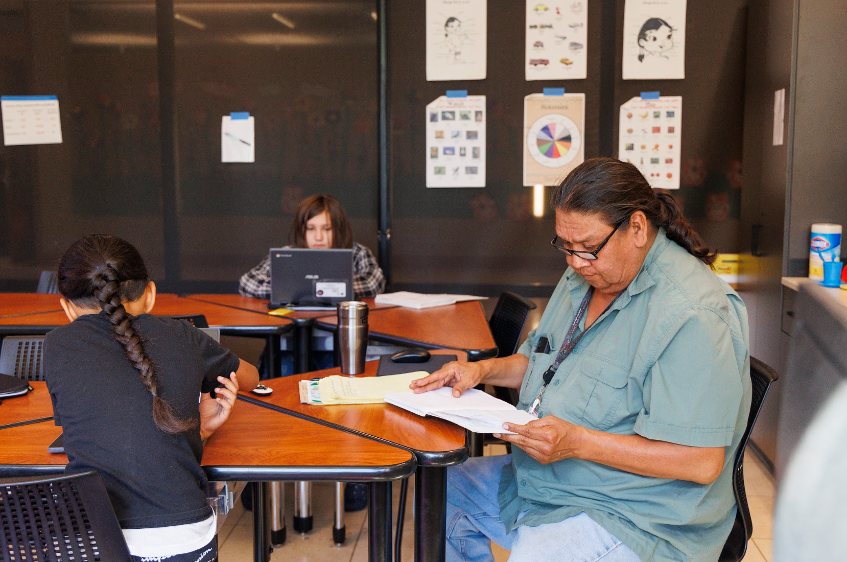 Ho-Chunk students and their teacher in the classroom.