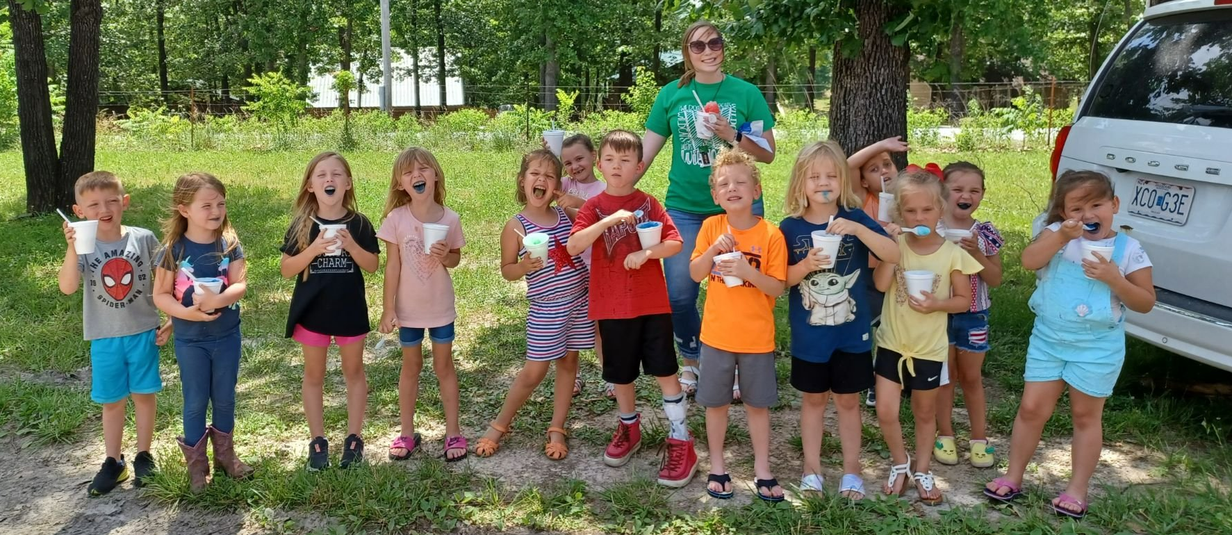 Summer school kiddos eating shaved ice