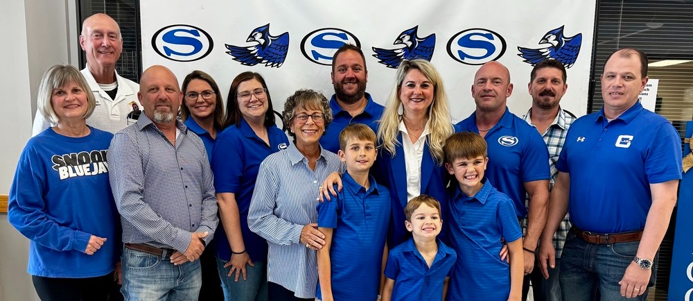 Kimberly Giesenschlag - New Superintendent family and board group photo