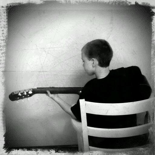 Kid with a guitar