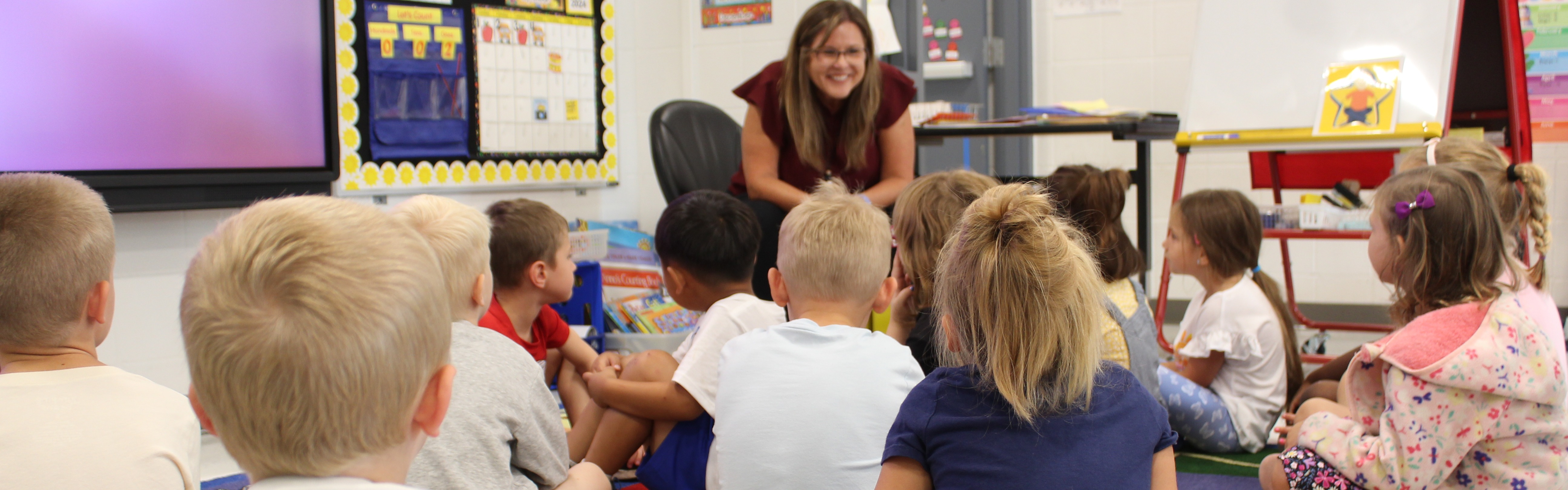 teacher talking to students