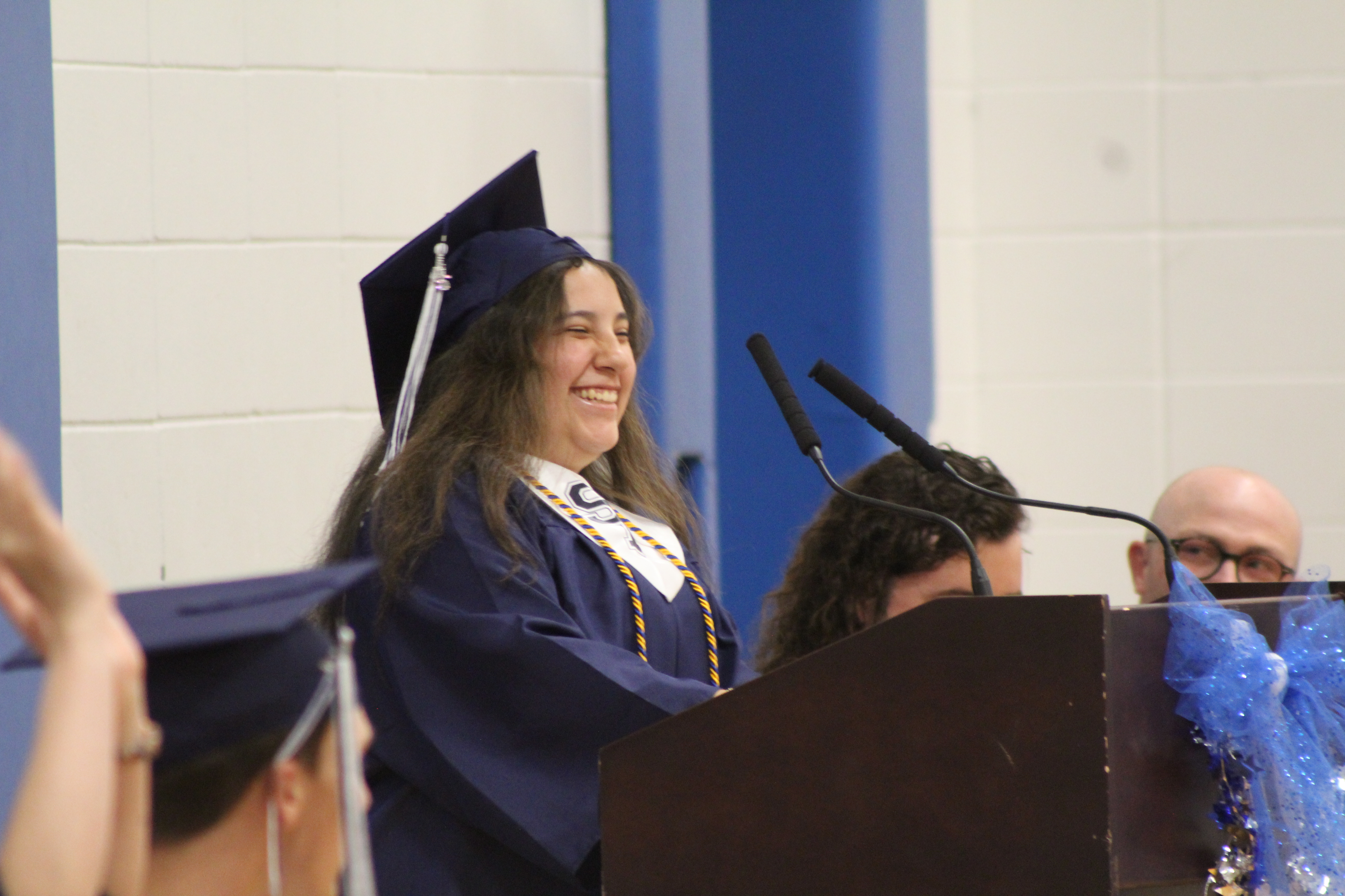 Graduate at podium