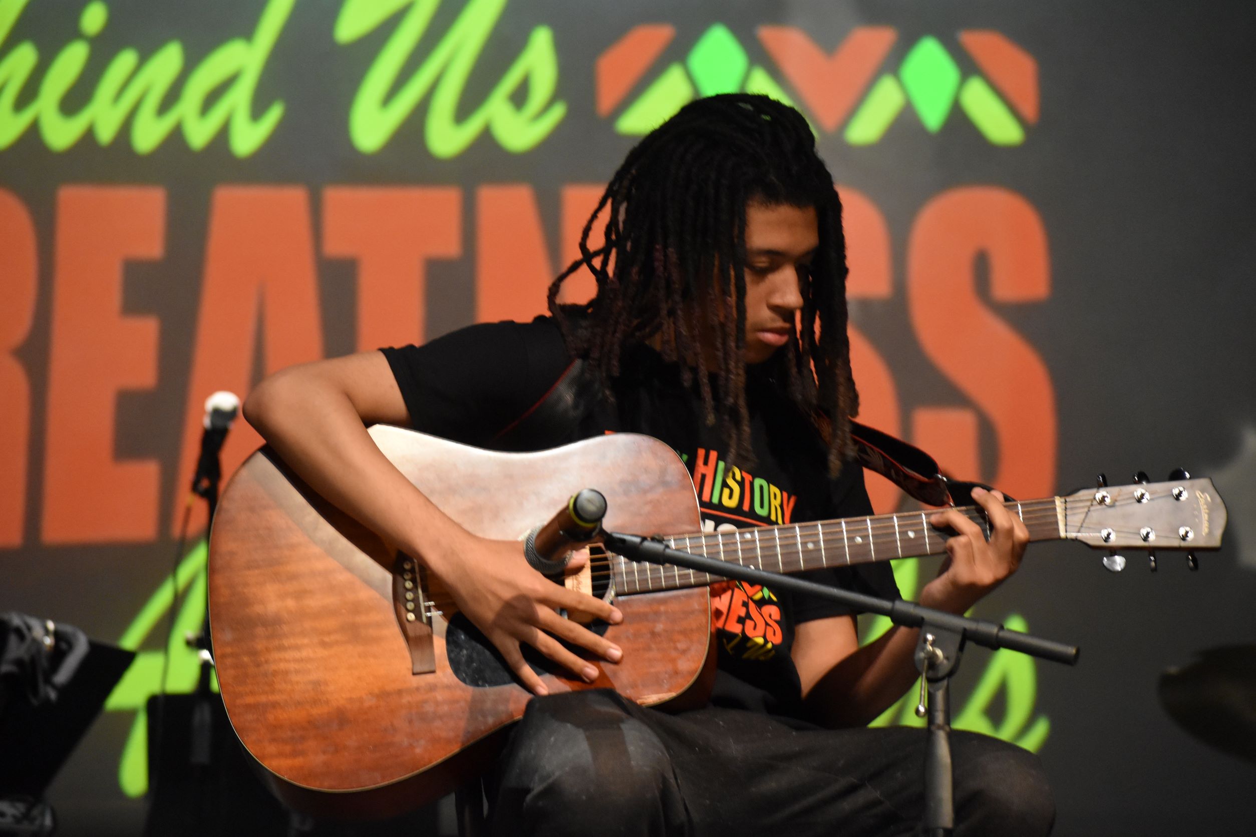 student playing guitar