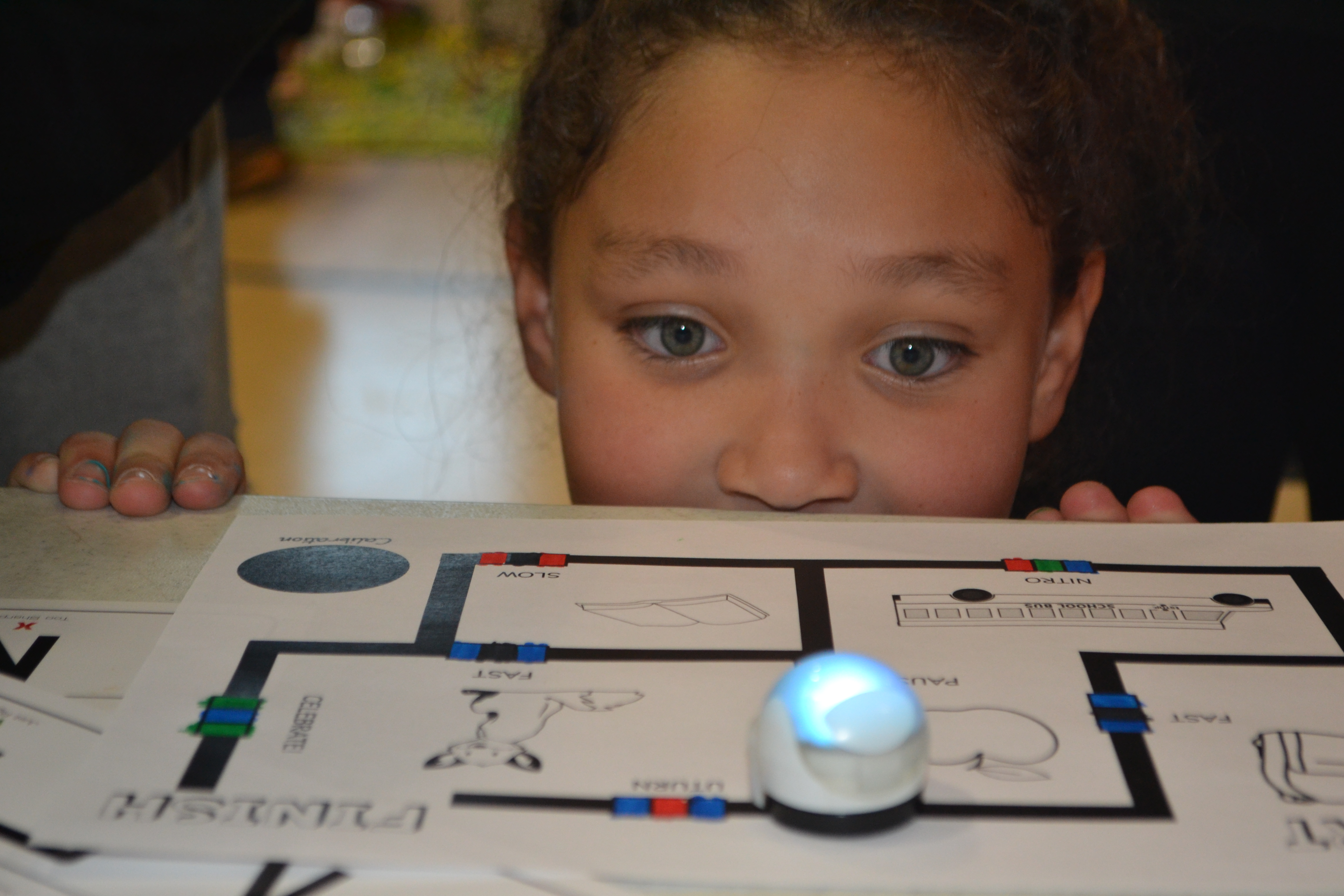 student watching ozobot