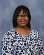 Mrs. Bullock-Parker smiling at the camera