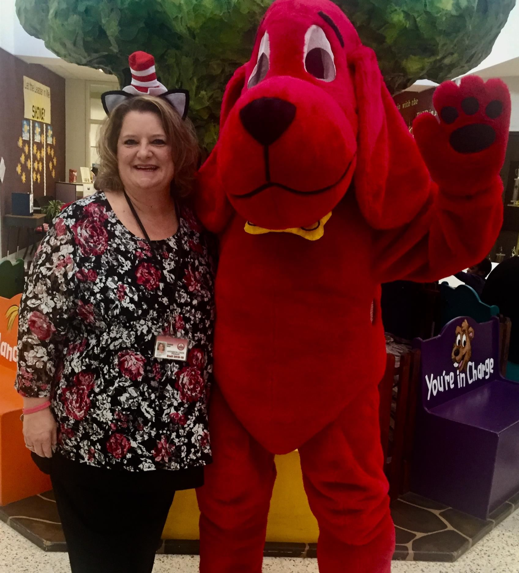 Mrs. Bolton posing with Clifford the Big Red Dog