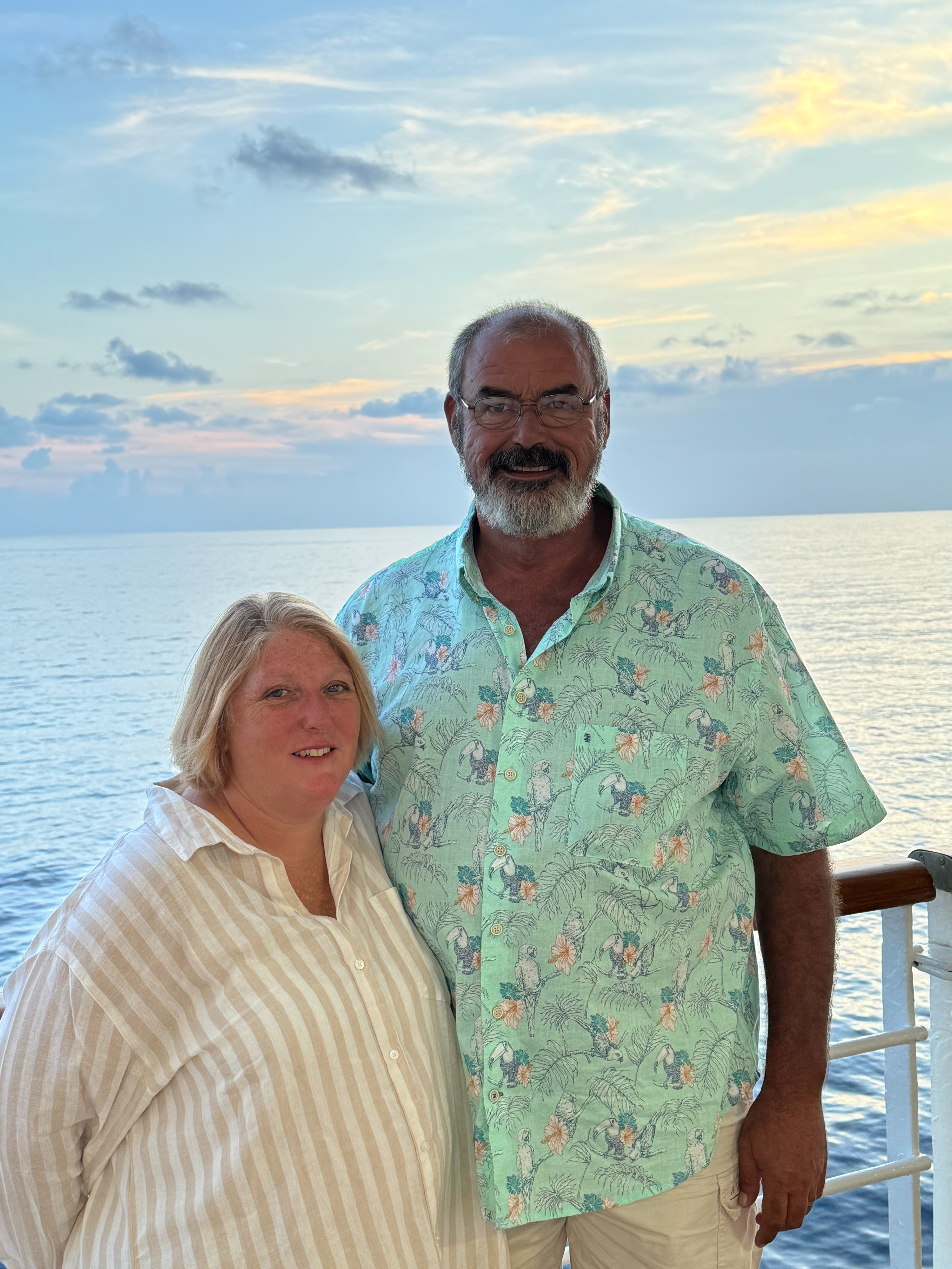 Mrs. Webb smiling with her husband Scott