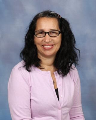 Smiling woman wearing pink sweater