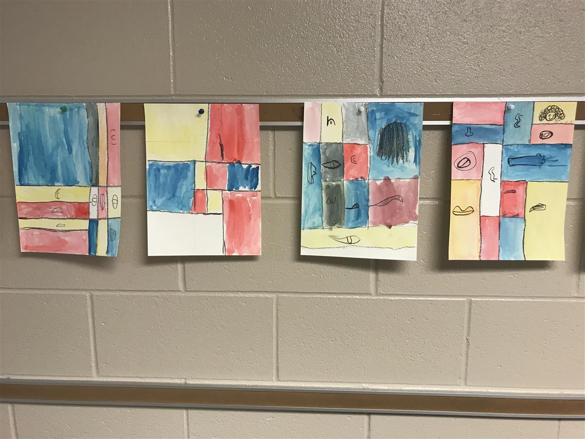 student art hanging on a wall 