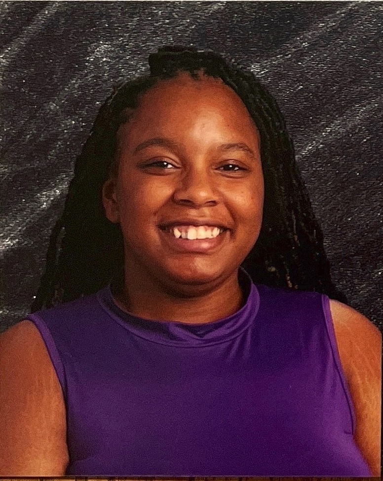 Ms.Bryan in purple shirt