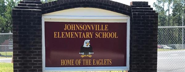front sign for JES 