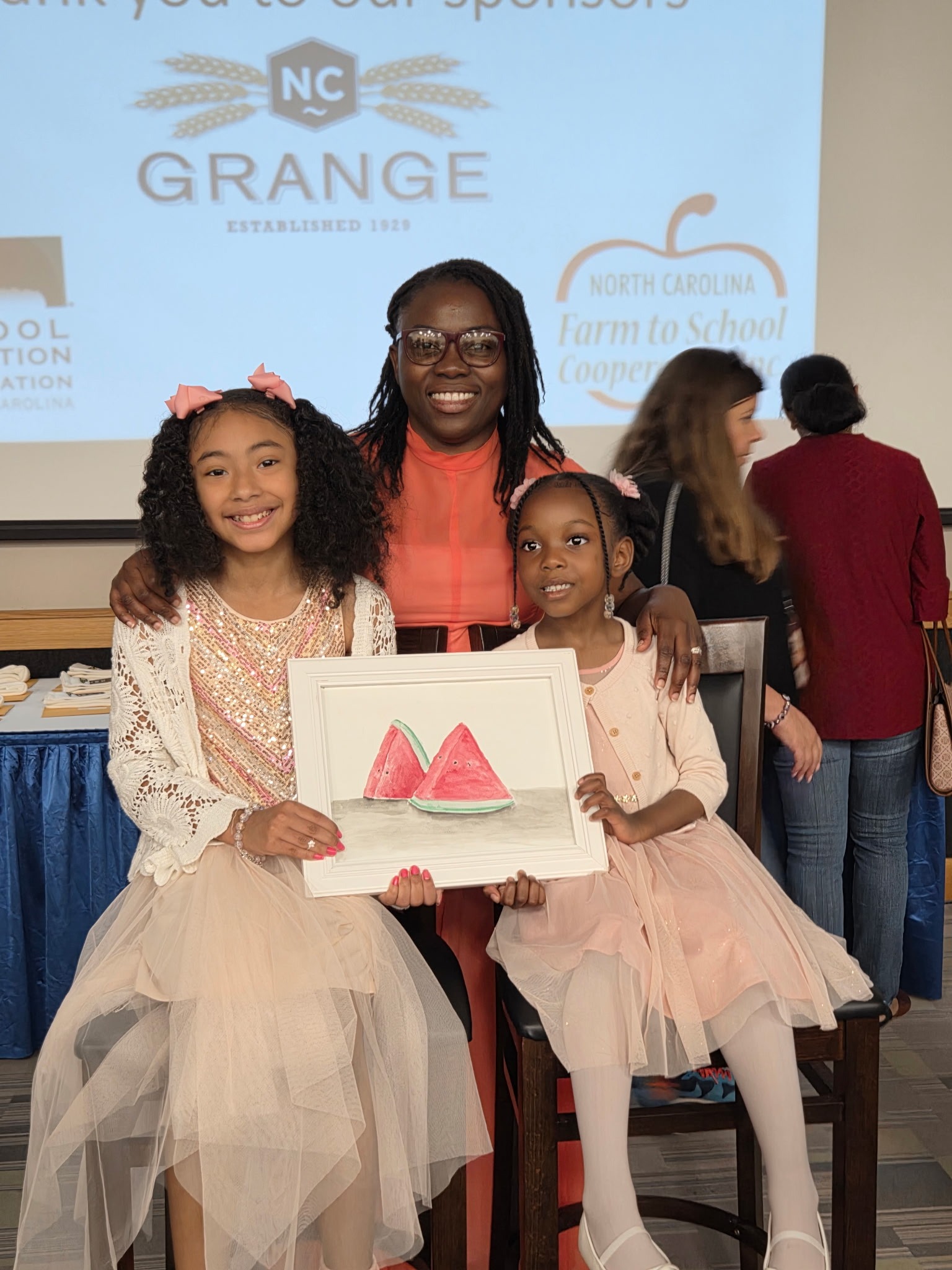 Congratulations to the outstanding K. Herrera (left) for winning the Farm to School 2024-2026 Art competition