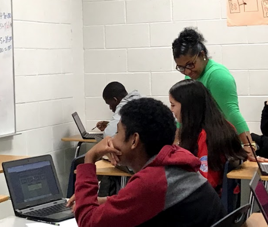 students with laptops