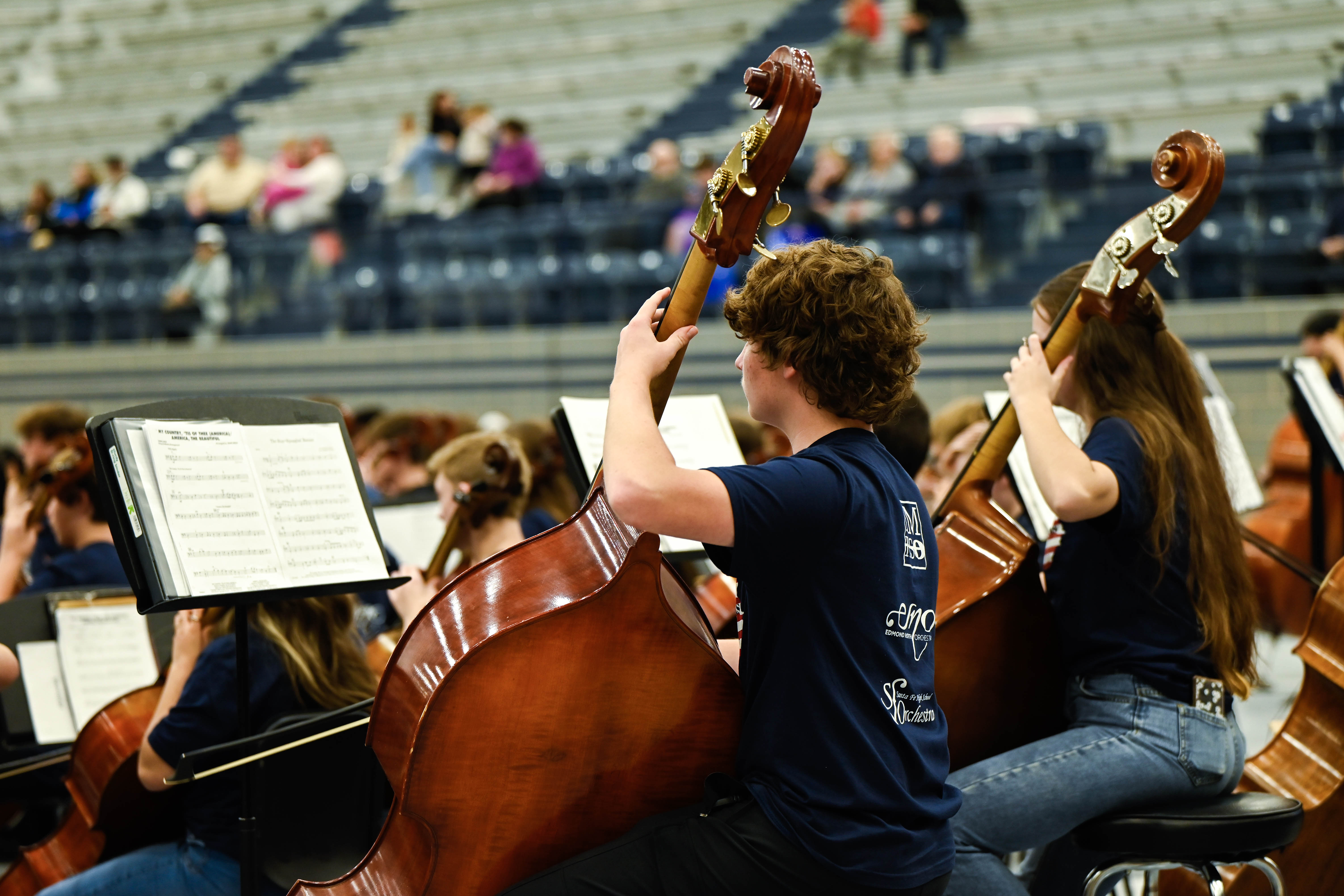 High School Boy Playing the Bass at a Concert